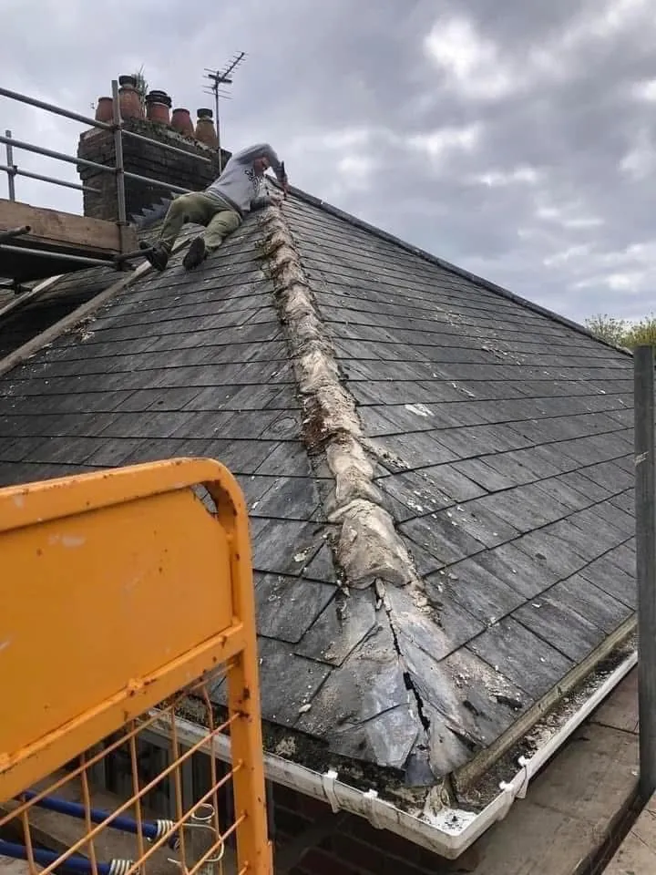 Slate roof ridge and chimney repair in Saltash